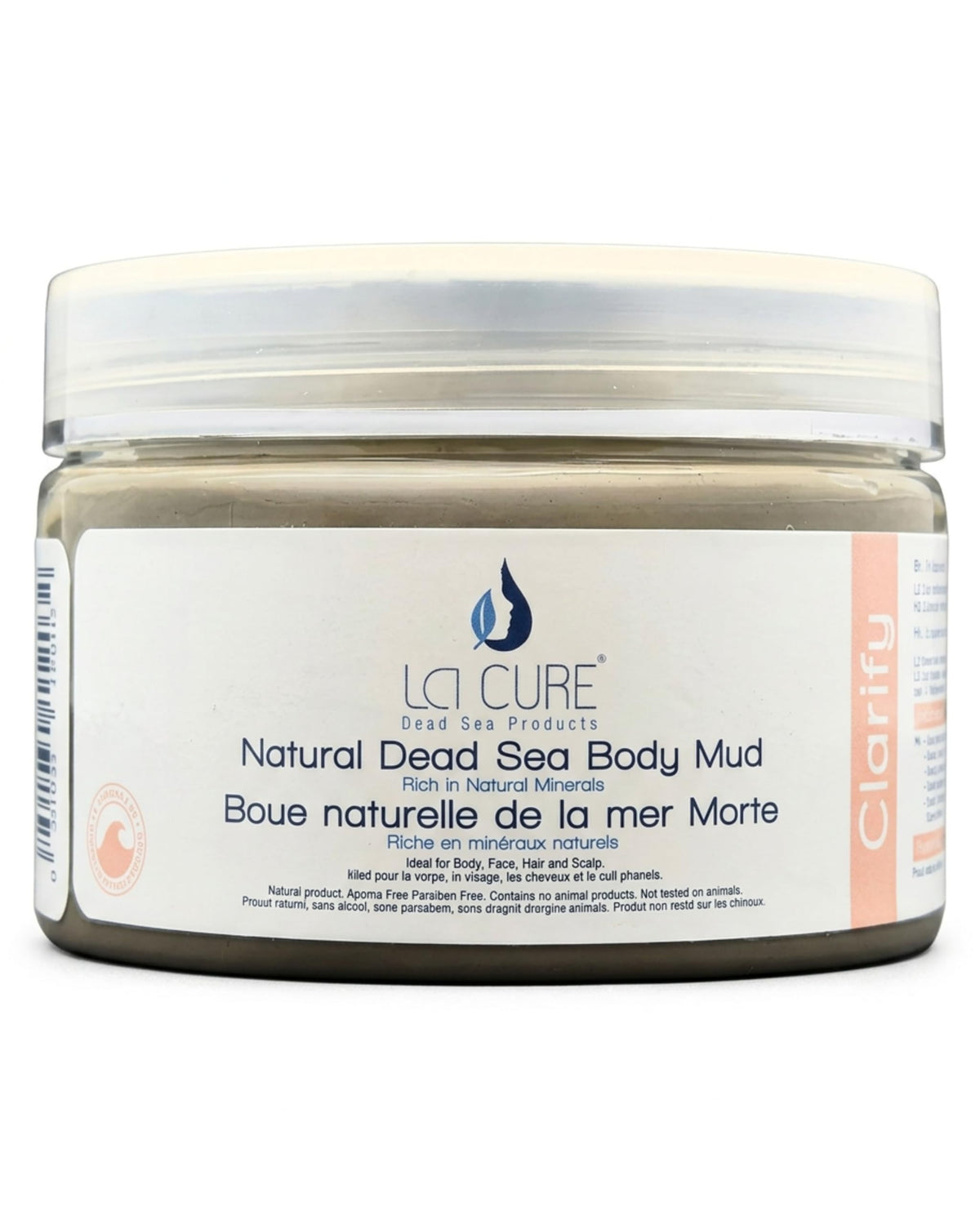 A jar of LA CURE Natural Dead Sea Body Mud, featuring a white label with blue and peach text, set against a plain white background.