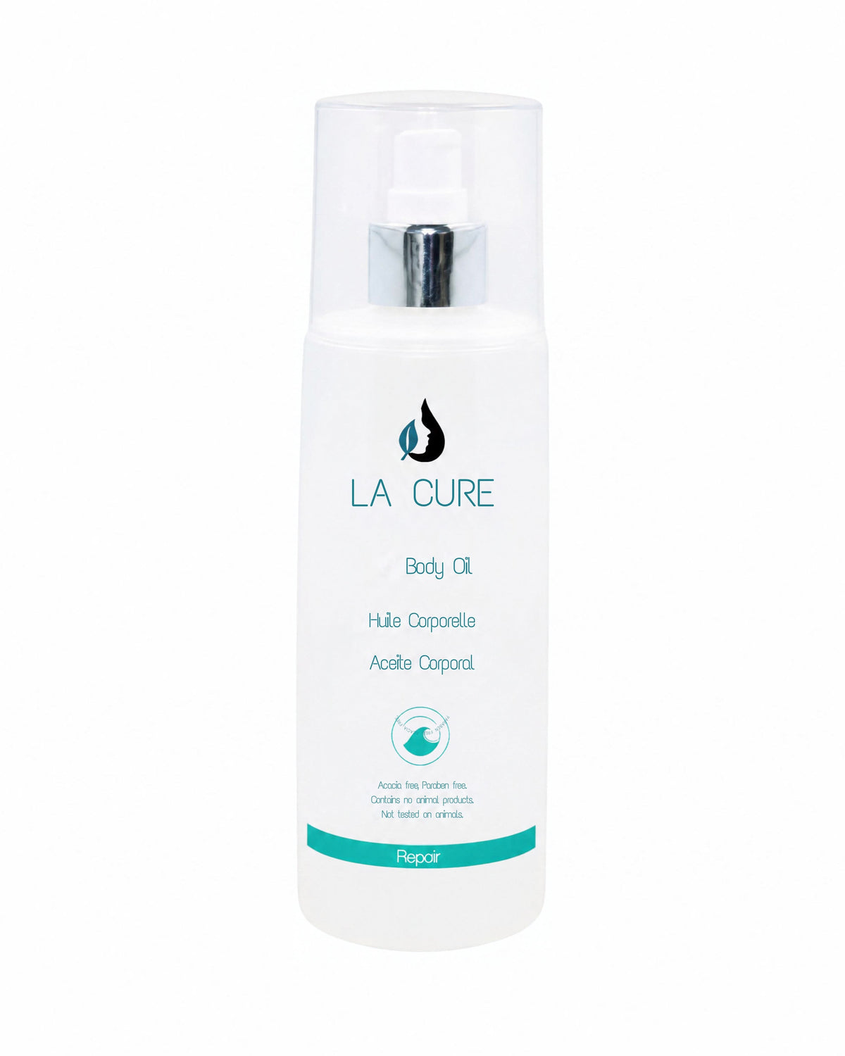 A white bottle of LA CURE Body Oil with a clear cap and silver pump, featuring teal and black text on a white background.